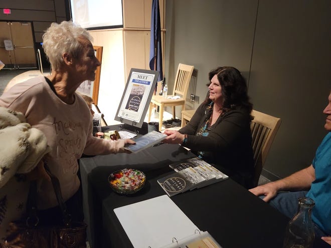 Following her presentation, local author Shawna Mazur spoke one-on-one with attendees and autographed copies of her book, “The Hidden History of Monroe County Michigan.”