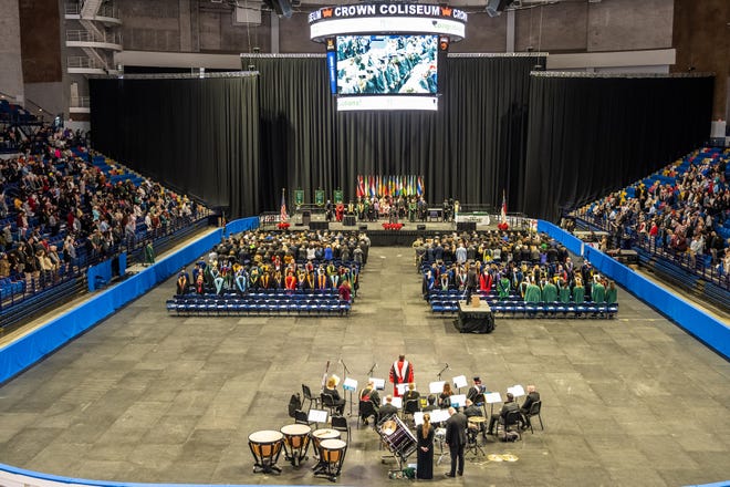 A large gathering of family, friends and loved ones watch Methodist University’s 50th Winter Commencement at the Crown Coliseum on Saturday, Dec. 10, 2022.