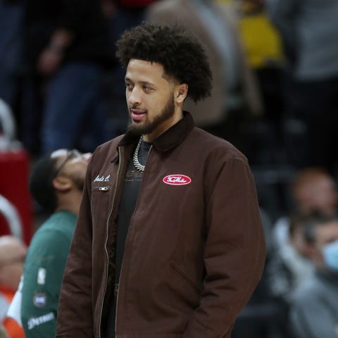Detroit Pistons guard Cade Cunningham on the bench