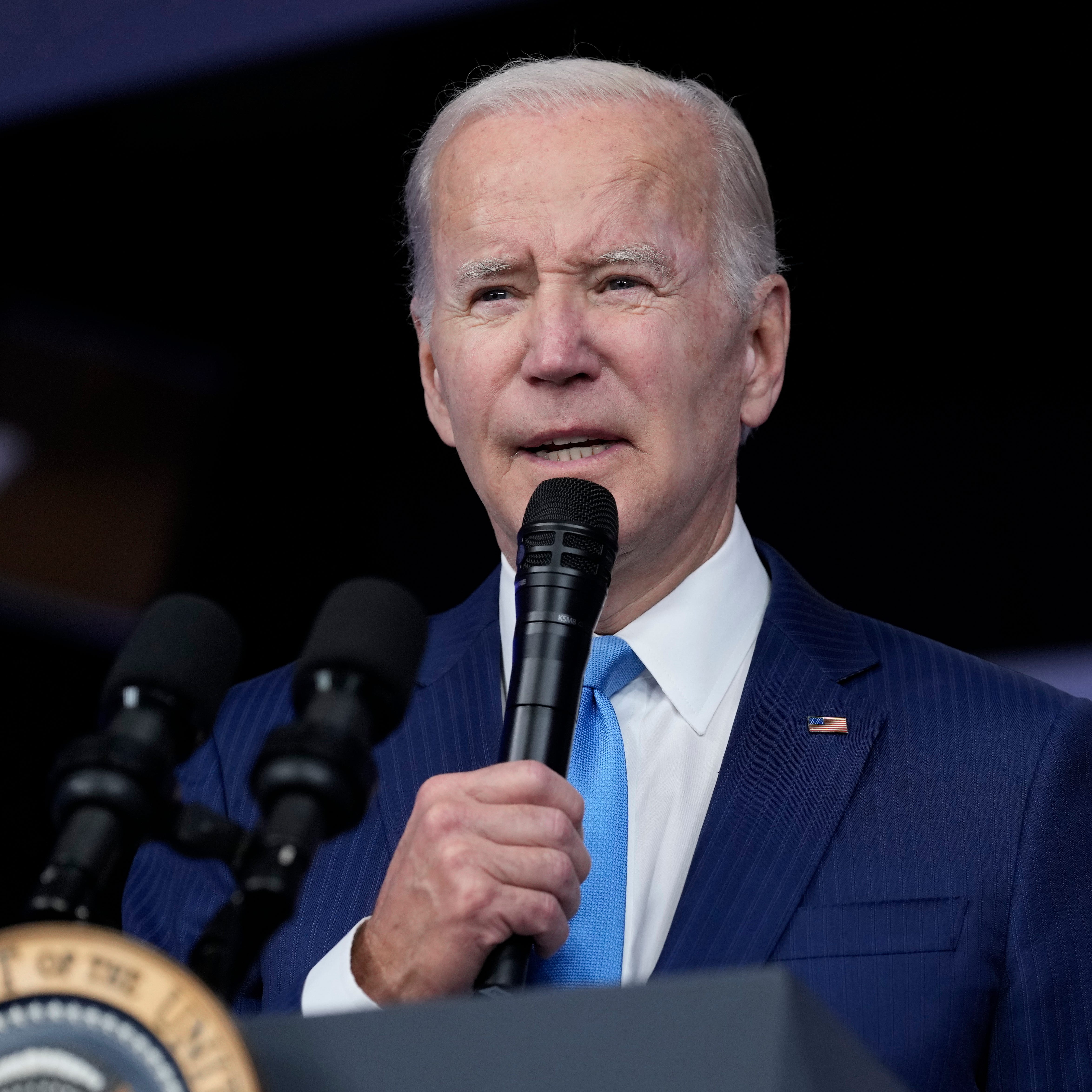 President Joe Biden speaks in the South Court Auditorium on the White House complex in Washington, Dec. 8, 2022. Biden is set to sign legislation into law Tuesday protecting same-sex and interracial marriages.