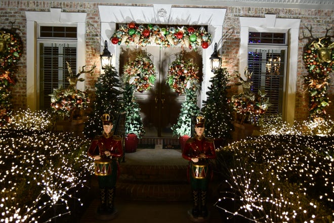 Joy Chudzinski decorates her home and yard to share her love of Christmas with others.  The holiday display runs from 6 to 10 p.m. through Jan. 1 at the Chudzinski's home, 252 James Place, Fremont.