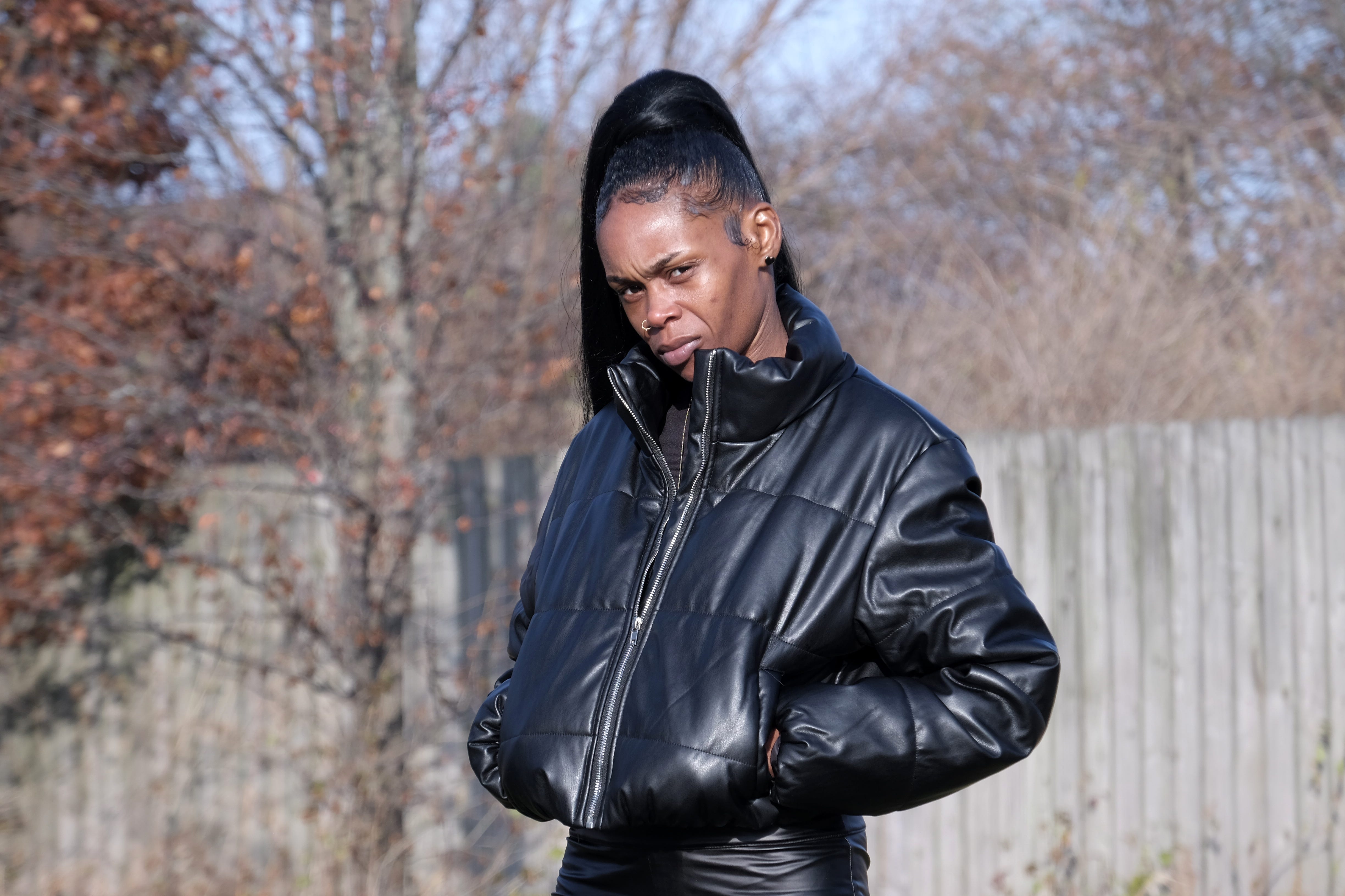 Crystal Allen, 37, stands outside her home in Lafayette, Indiana, on Dec. 13, 2022.