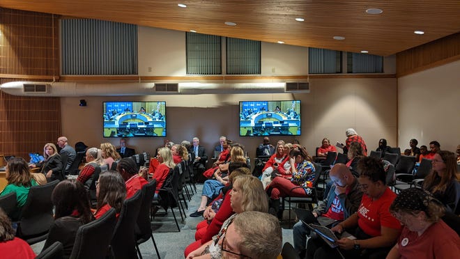 In this file photo, Volusia United Educators members, dressed in red, attend the Dec. 13 Volusia County School Board meeting to request better pay and working conditions as the union and district continue to bargain.