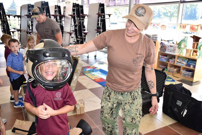During Navy Week, sailors from the Navy Diver unit bring interactive displays and gear for everyone to try out. One of the Navy's favorite things is interacting with the children and allowing them to "try it on for size" and to learn what goes into being a Navy Diver.