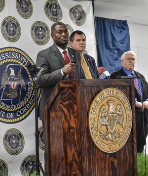 Jeworski Mallett (left), Deputy Commissioner of Institutions for the MDOC, Karei McDonald (center), Executive Deputy Commissioner, and MDOC Commissioner Burl Cain (right) speak to the media ahead of the scheduled execution of Thomas "Eddie" Loden at Mississippi State Penitentiary at Parchman on Wednesday.