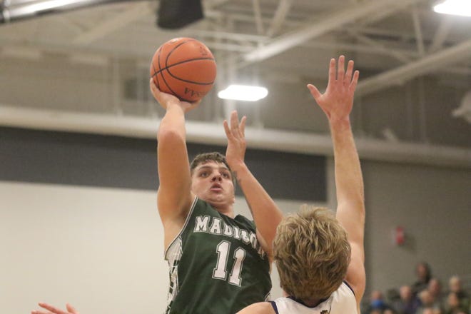 Madison's Jayden Jeffries goes up for a tough shot during a loss to Lexington on Tuesday night.