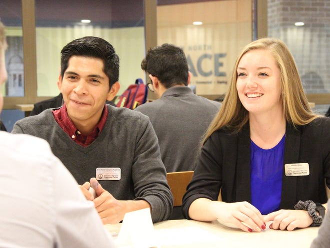 UW-Stevens Point business students Jose Saul Vasquez and Mikkalyn Hafner participated in a networking reception with local organizations as part of the Smiley Professional Events Program in the School of Business and Economics.