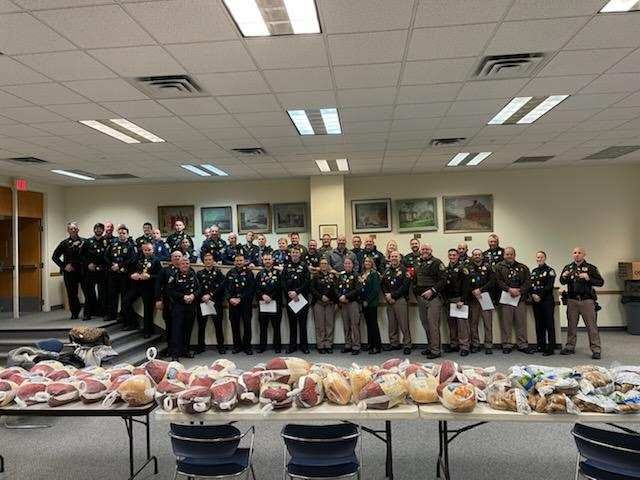 St. Clair County law enforcement officers participate in Christmas with a Cop Wednesday, Dec. 14, 2022.