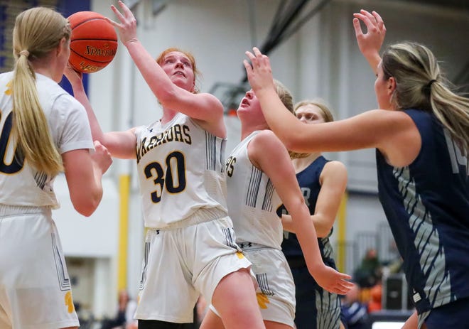 Wausau West High School's Molly Anderson (30) puts a shot up against Xavier High School on Tuesday, December 13, 2022, at Wausau West High School in Wausau, Wis. Wausau West won the game, 57-47.Tork Mason/USA TODAY NETWORK-Wisconsin 
