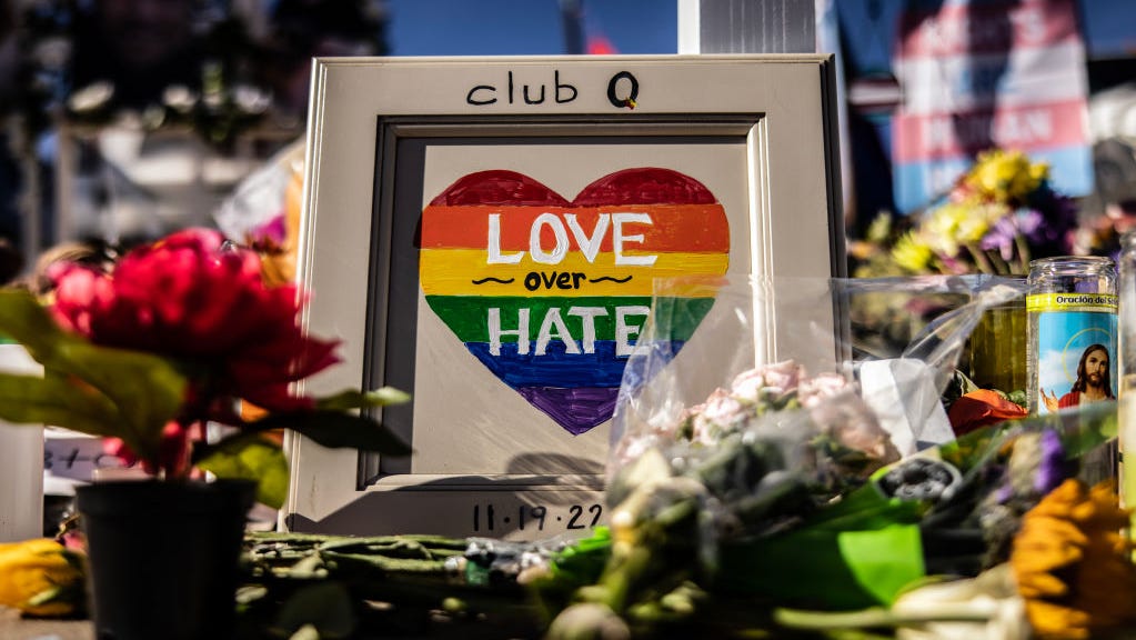 Mourners at a memorial outside of Club Q on November 22, 2022 in Colorado Springs, Colorado. A gunman opened fire inside the LGBTQ+ club on November 19th, killing 5 and injuring 25 others.
