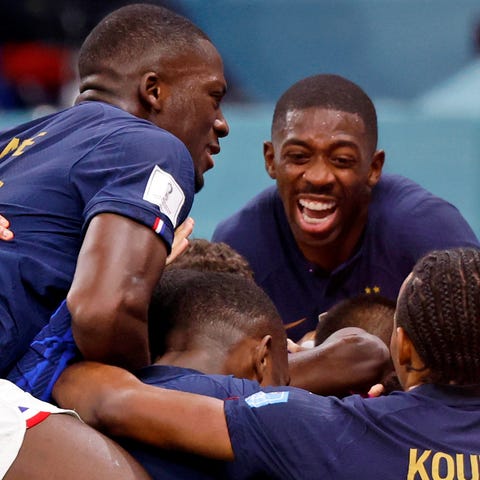 France celebrates after forward Randal Kolo Muani 