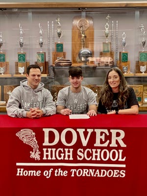 Dover High School wrestling standout Egidio DiFazio will wrestlie at Lake Erie College in Painesville. DiFazio, the son of Sarah and Egidio DiFazio of Dover, was a state qualifier at 138 pounds last season and was named first team All-OVAC and All-ECOL. He will earn his fourth letter in wrestling this season and is also a member of the cross country and track and field teams. He is pictured with his parents at his signing ceremony. Lake Erie College is a NCAA Division II school and a member of the Great Midwest Athletic Conference.