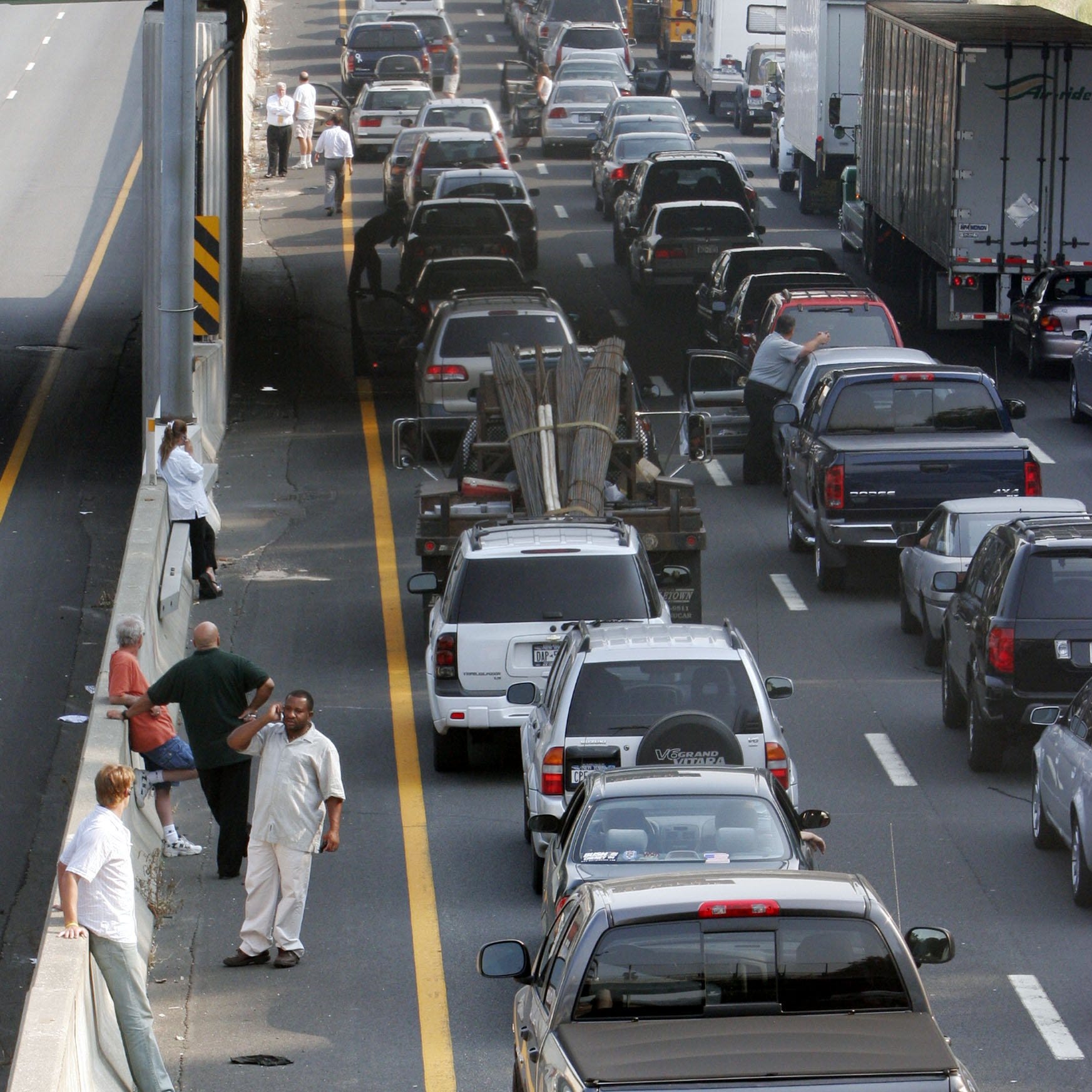 Motorists turned into pedestrians on the southbound New York State Thruway in Nyack as an accident and truck fire closed both Westchester and Rockland bound traffic on the Tappan Zee Bridge Sept. 13, 2005. New figures from the Thruway Authority show a 68% decrease in crashes on the Gov. Mario M. Cuomo Bridge, the Tappan Zee's replacement, in 2021, as compared to the last full year of the Tappan Zee in 2016.