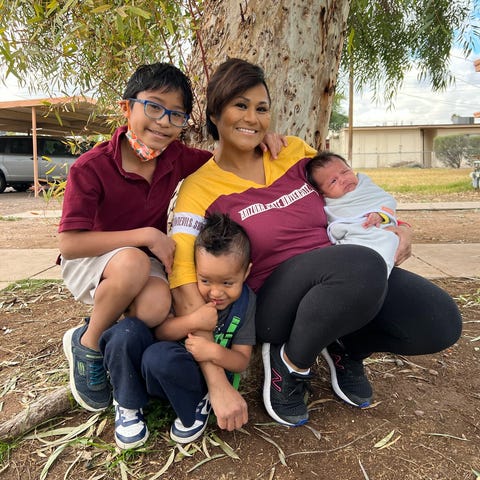 Karla Garcia with her three children in Tempe, Ari