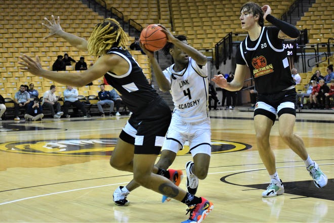 Link Academy's Ja'Kobe Walter (4) drives against Southern California Academy's Drew Fielder (2) at the 2022 Norm Stewart Classic on Dec. 15, 2022, at Mizzou Arena in Columbia, Mo.