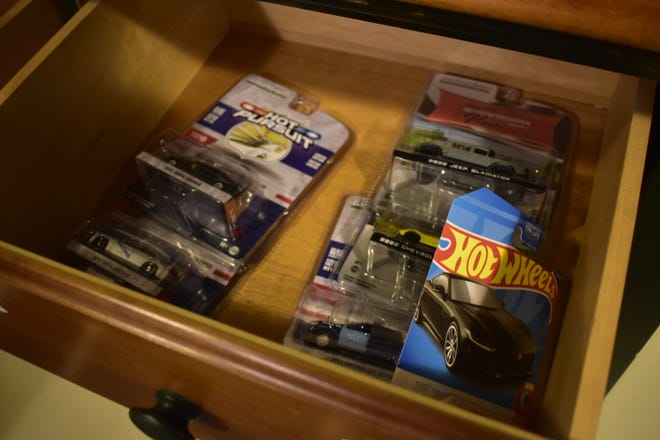 Alex Tanford has several cars still in the package and tucked away in drawers waiting to be put on display.