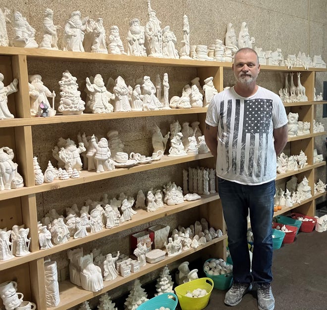 Wayne Wade, co-owner of Crazyhouse Ceramics with Brandy Thompson, which opened in June at 109 E. Main St., Newark, in a small strip center between the Speedway gas station and the Skylight wedding venue.