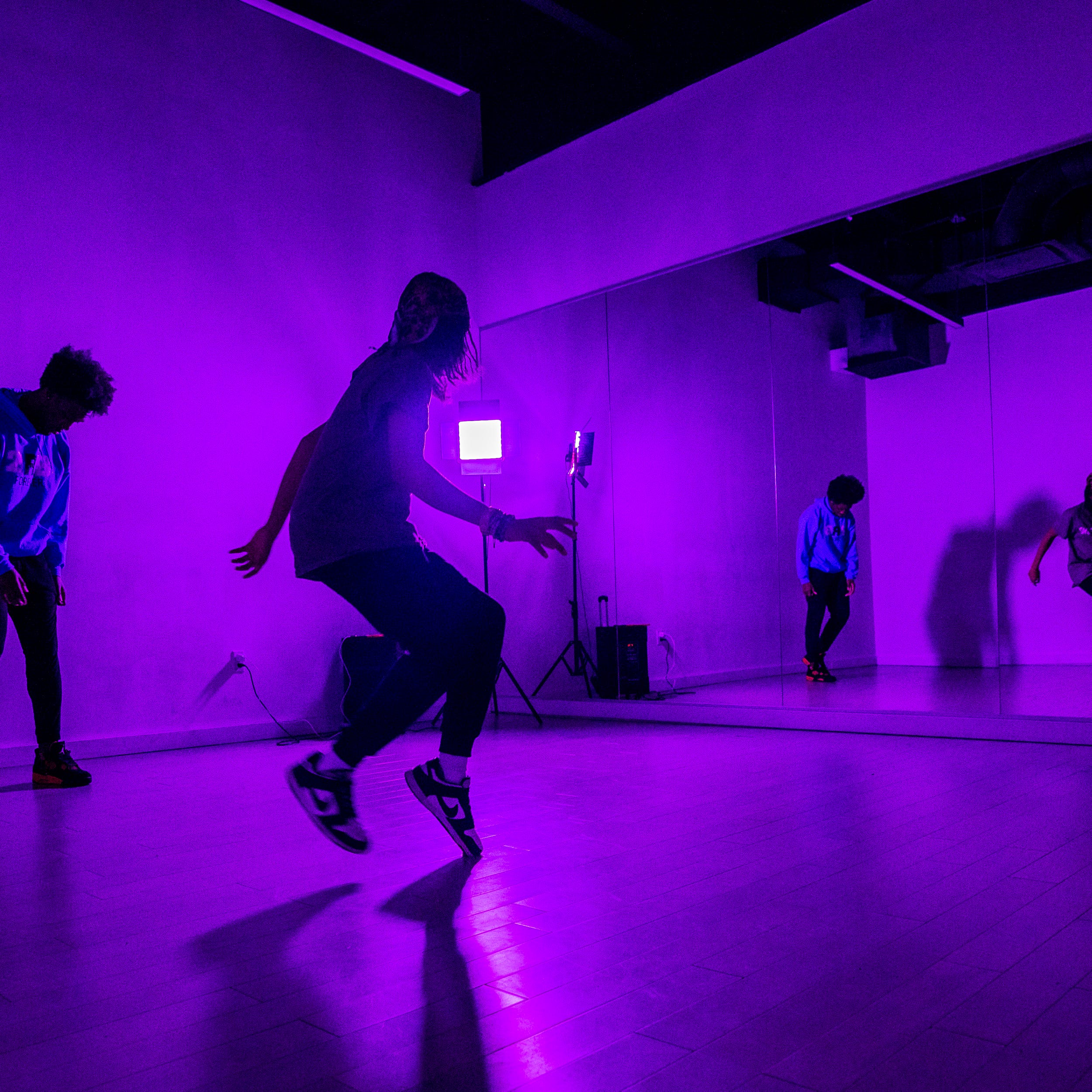 Jay Black teaches a Litefeet dance class at Modega in the Long Island City sections of Queens on Thursday, Dec. 15, 2022. (From left) Jay Black and Jaeran Mauricio who goes by Loco.