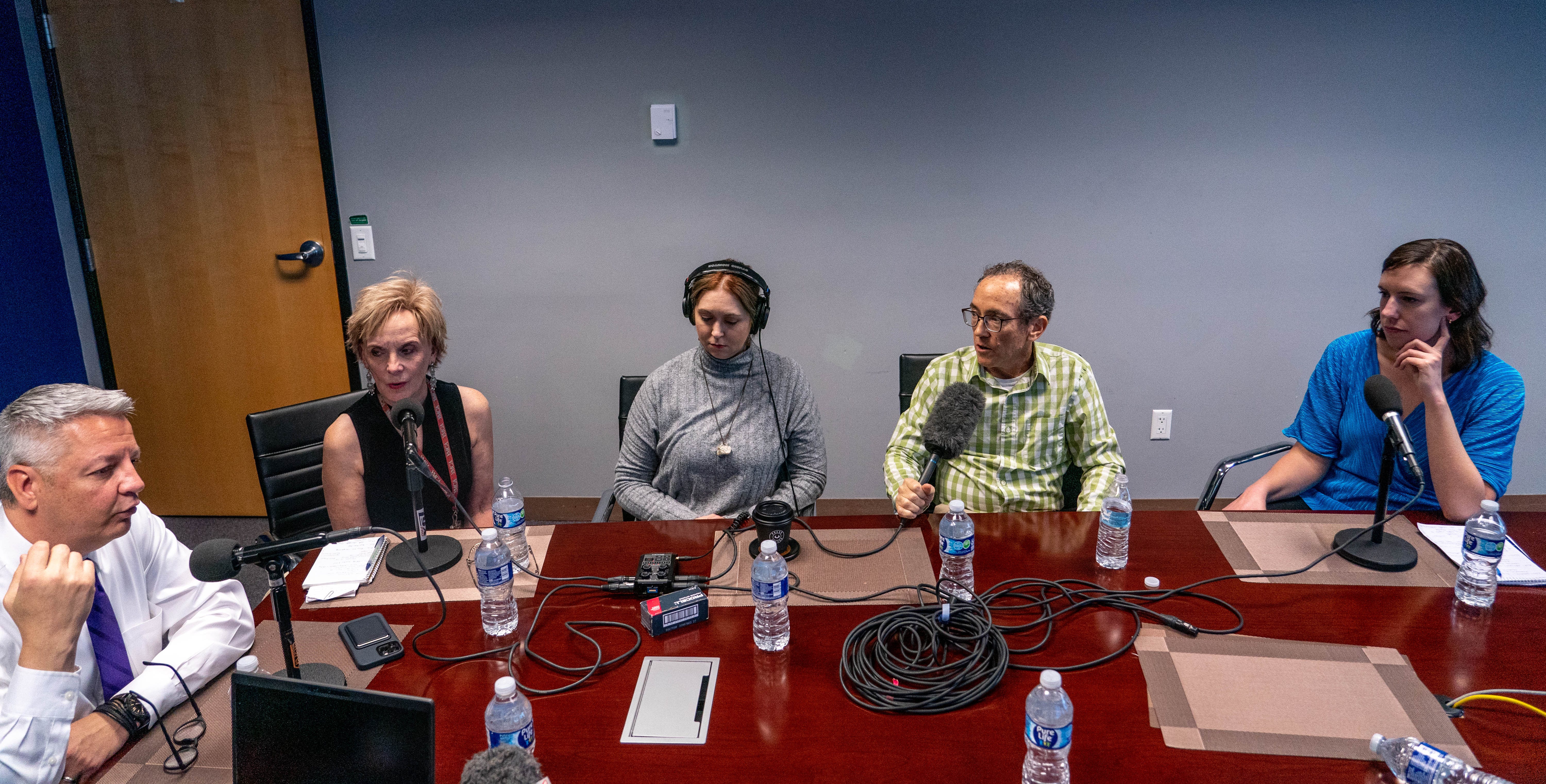 Arizona Republic staffers Ronald J. Hansen, left, Mary Jo Pitzl, Kaely Monahan, Ray Stern and Stacey Barchenger record an episode of The Gaggle at the Republic newsroom in Phoenix on Dec. 15, 2022.