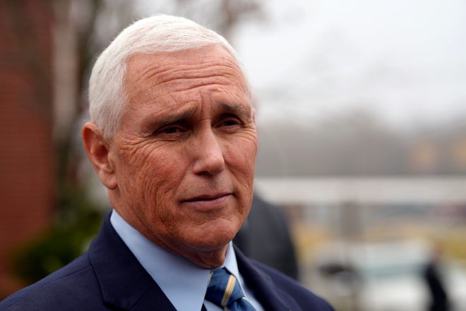 Former Vice President Mike Pence signs copies of his new book after speaking to an audience at Garden Sanctuary Church of God in Rock Hill, S.C. on Dec. 6.