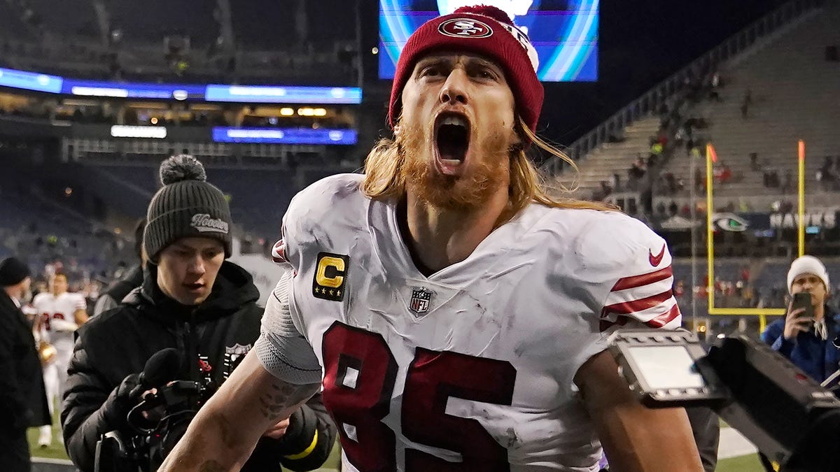 George Kittle celebrates after the 49ers defeated the Seahawks.