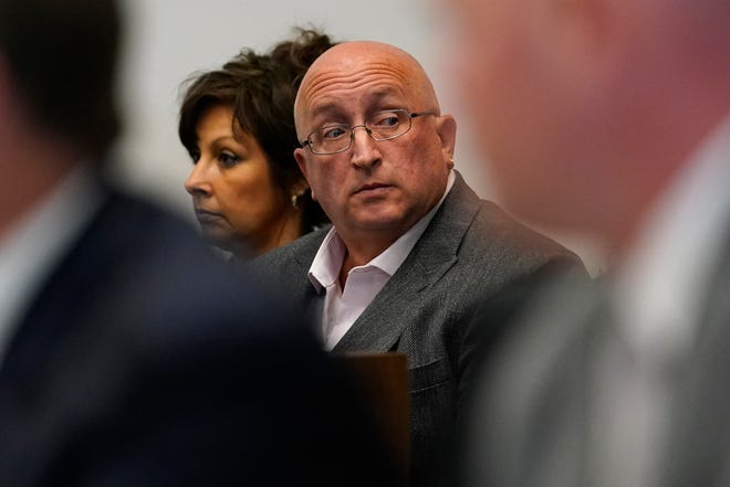 Robert E. Crimo III's father Robert Crimo Jr., right, and mother Denise Pesina attend to a hearing for their son in Lake County court on Aug. 3, 2022, in Waukegan, Ill.