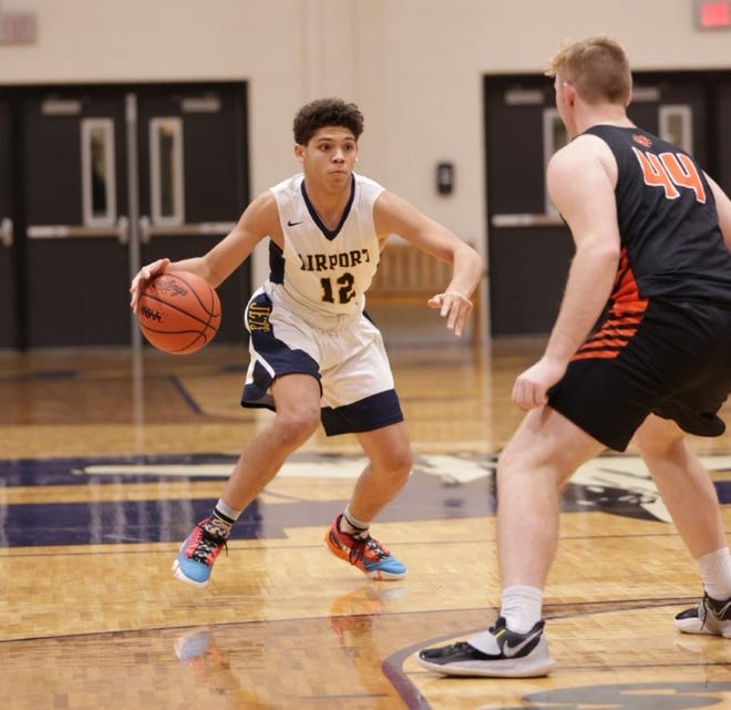 Jayden Harper-Lewis handles the ball for Airport against Brighton Saturday night. The Jets fell 66-41.