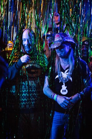 Brian Baumgartner, left, and Bret Michaels went full-on party mode for an opening spot for the Packers-Rams game on "Monday Night Football" that was filmed a week ago in Los Angeles.