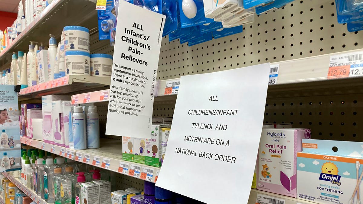 A sign is placed near the section for children's medicine, Sunday, Dec. 18, 2022 at a CVS in Greenlawn, N.Y. Caring for a sick child has become even more stressful than usual for many U.S. parents in recent weeks due to shortages of Childrenâ€™s Tylenol and other medicines. (AP Photo/Leon Keith)