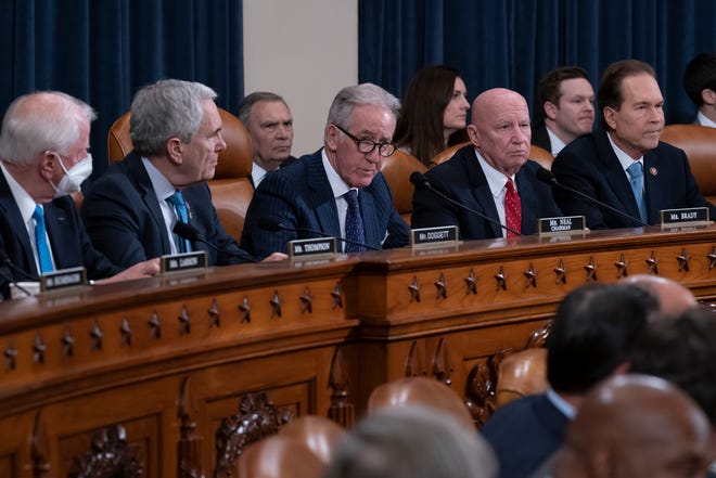 House Ways and Means Committee Chairman Richard Neal, D-Mass., center, and Rep. Kevin Brady, R-Texas, the ranking member, center right, and other committee members, meet to act on former President Donald Trump's tax returns on Dec. 20, 2022.