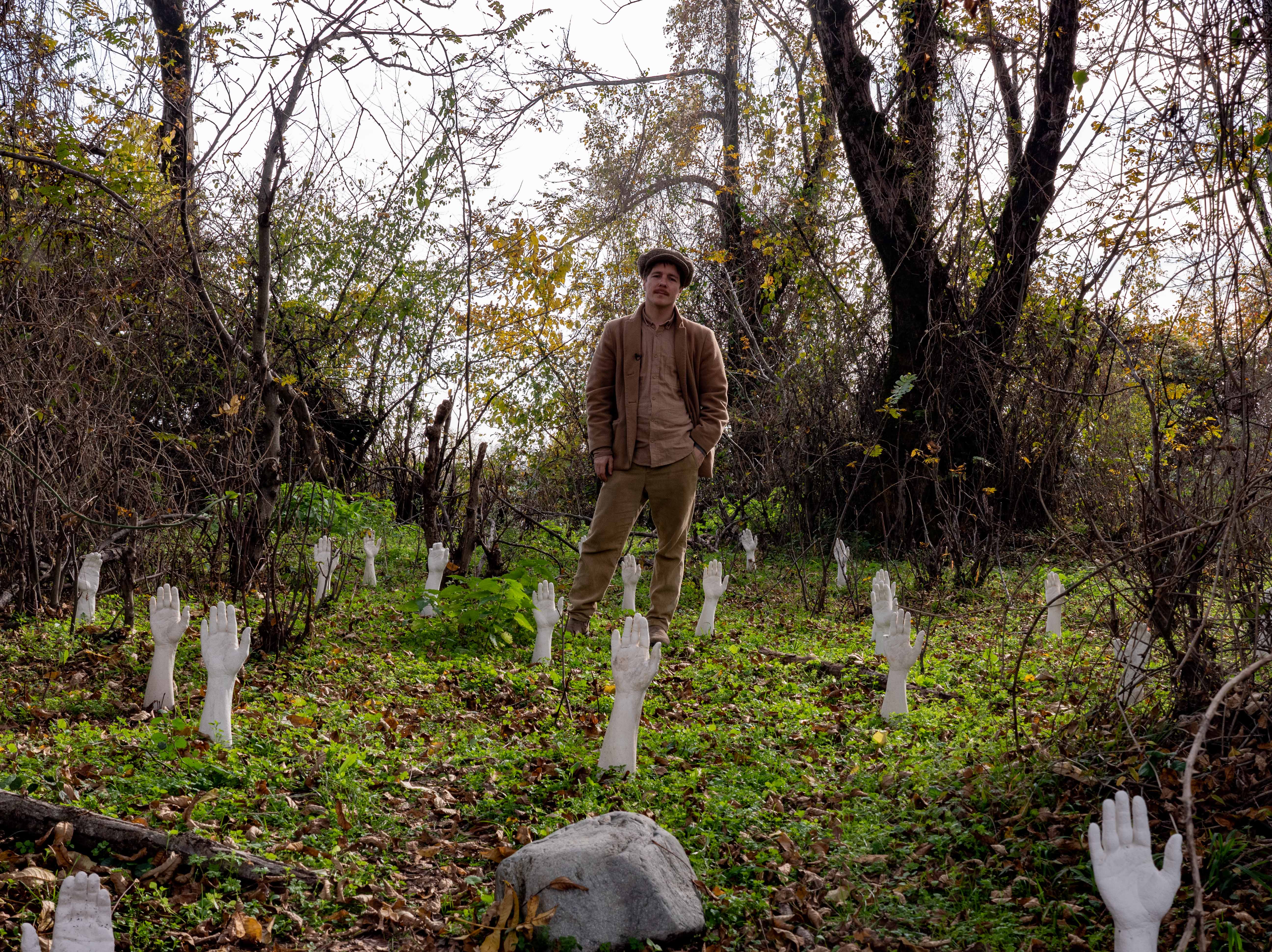 Chateau Chapiteau founder Vanya Mitin stands amid an art installation on the grounds of the commune a few hours northeast of Tbilisi, Georgia.