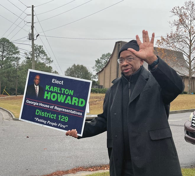 Karlton Howard campaigns for himself outside the Belle Terrace Presbyterian Church polling place in Augusta, GA on Tuesday, Dec. 20 2022 during Election Day for the special election to represent Georgia House District 129. Howard won, succeeding his late brother, Rep. Henry "Wayne Howard" who died in October.