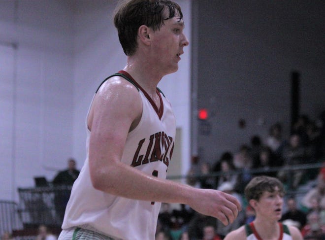 Lincoln senior guard Camden Nelson totaled 15 points with five 3-pointers in a 61-23 nonconference boys basketball victory over Chatham Glenwood on Tuesday, Dec. 20, 2022.