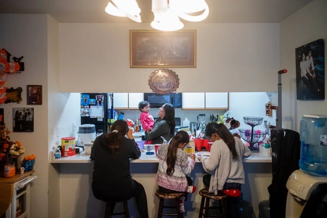 Ivonne Sonato-Vega says expanding child tax credits would help families like hers. She and her children have breakfast in their home in Santa Rosa.
