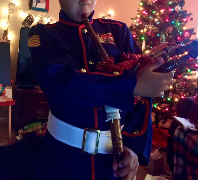 Quajay Donnell's son, affectionately known as the Fry Guy, asked for a year for a navy uniform and bagpipes.