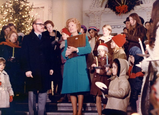 This photo of first lady Pat Nixon greeting candle lighters on the steps of the North Portico was taken by Jack E. Kightlinger during a tour in 1972.  The Candlelighters Childhood Cancer Family Alliance is an organization that provides emotional, educational, practical and financial support to families of children fighting cancer.