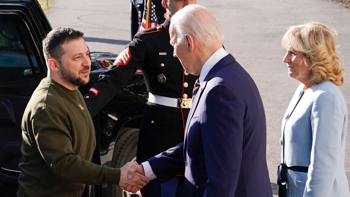 President Joe Biden shakes hands with Ukrainian President Volodymyr Zelenskyy as he welcomes him to the White House, Wednesday, Dec. 21, 2022, in Washington. First lady Jill Biden is at right. (AP Photo/Patrick Semansky) ORG XMIT: DCPS402