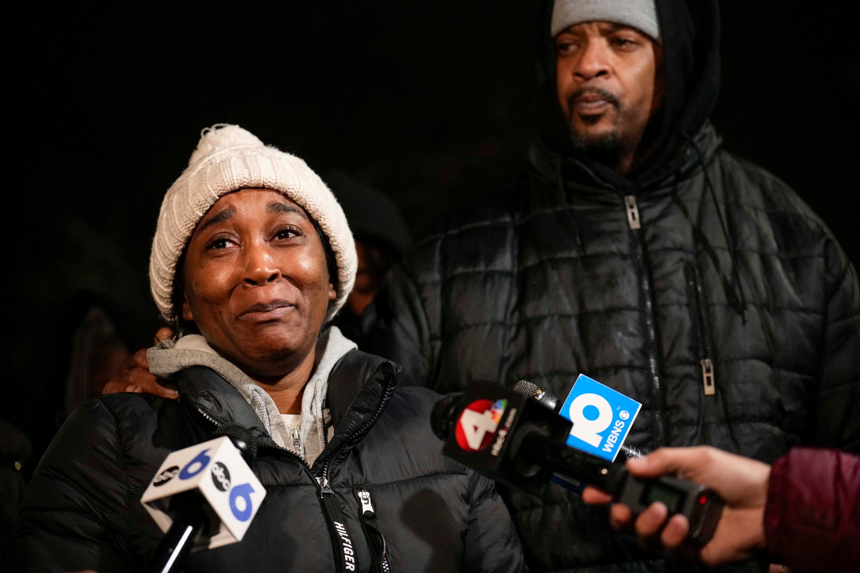 LaFonda Thomas, left, grandmother of abducted twins Ky'air and Kason Thomas talks to reporters as the search for Kason continues on Dec. 22. Ky'air had been found two days earlier.