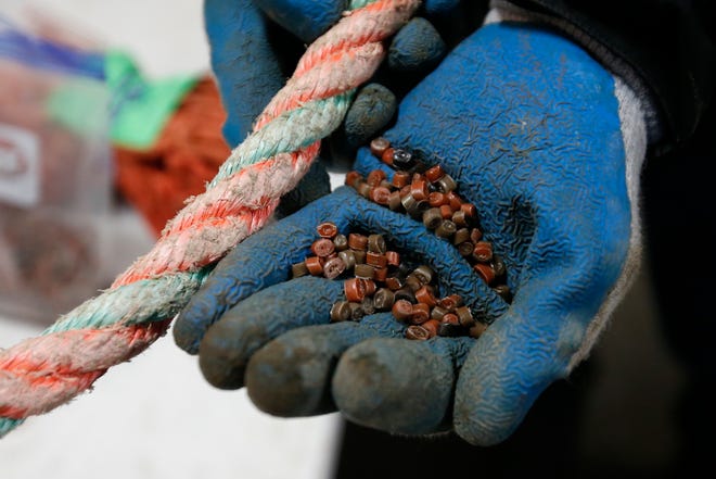 The rope on the left will be recycled into the pellets on the right, which can then be used to create plastic parts from molds.  The nets and ropes are collected by Net Your Problem at their warehouse on King Street in New Bedford.