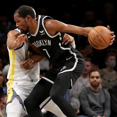 Brooklyn Nets forward Kevin Durant controls the ba