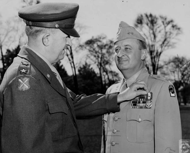 Former Marble Cliff mayor and resident Robert Beightler (right) became a famous Ohio political insider and military leader. Major Gen. Beightler commanded the “Buckeye Division,” the 37th Division of the Ohio National Guard, activated for battle in the Pacific during the World War II. The Beightler Armory in Columbus is named for him. He is shown receiving a medal from the deputy commander of the Second Army after the war ended.