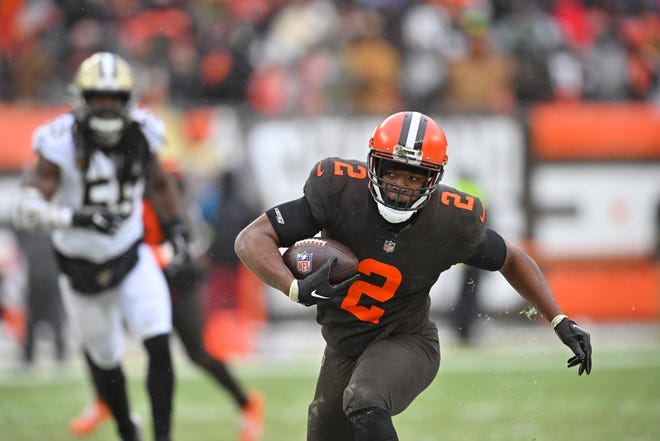 Cleveland Browns wide receiver Amari Cooper (2) rushes for a first down during the first half of an NFL football game against the New Orleans Saints, Saturday, Dec. 24, 2022, in Cleveland. (AP Photo/David Richard)