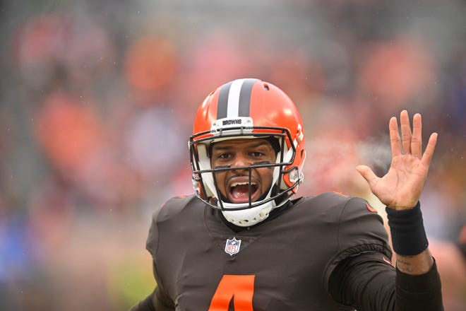 Cleveland Browns quarterback Deshaun Watson (4) reacts after his 12-yard rushing touchdown during the first half of an NFL football game against the New Orleans Saints, Saturday, Dec. 24, 2022, in Cleveland. (AP Photo/David Richard)