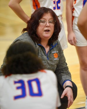 Garden City coach Michele Tyree talks to his team during a Western Wayne Athletic Conference women's basketball game on Thursday, Dec. 22, 2022.