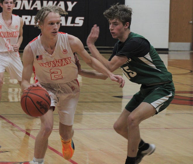 Senior guard Jadin Mix (left) and the Onaway boys basketball team picked up a recent victory over Presque Isle rivals Posen.