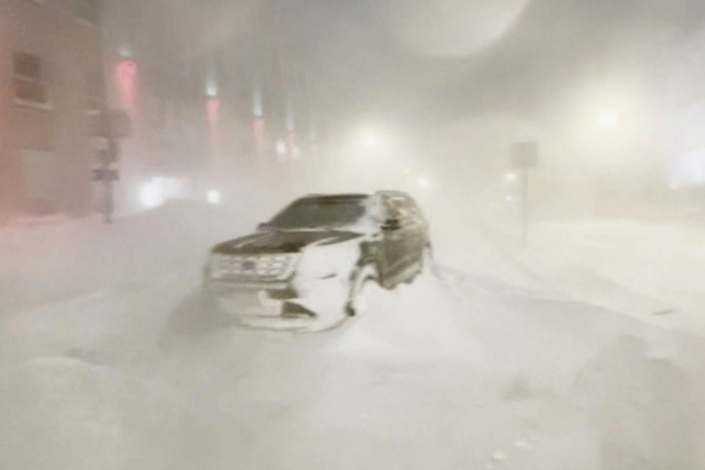 A vehicle covered in snow in Buffalo, N.Y. on early Sunday, Dec. 25, 2022.