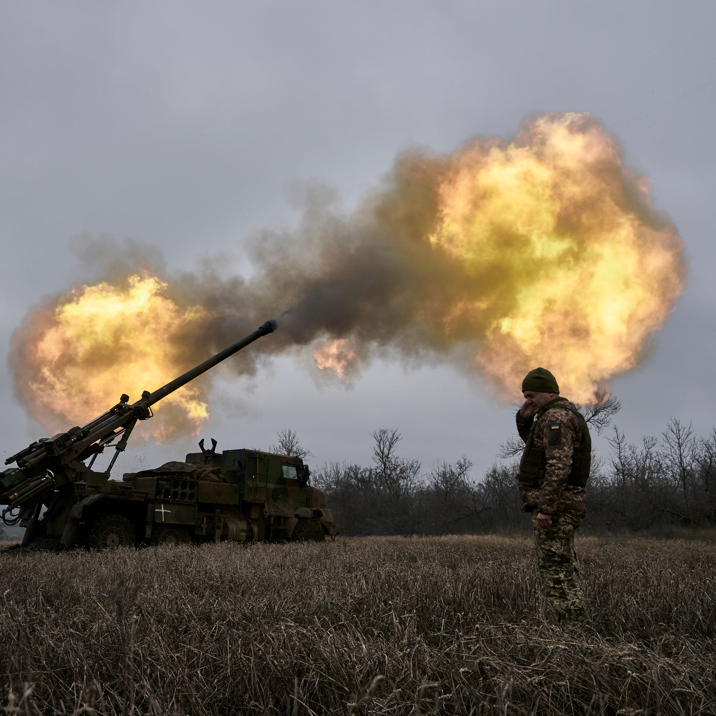 Ukrainian soldiers fire a French-made CAESAR self-propelled howitzer towards Russian positions near Avdiivka, Donetsk region, Ukraine, Monday, Dec. 26, 2022.