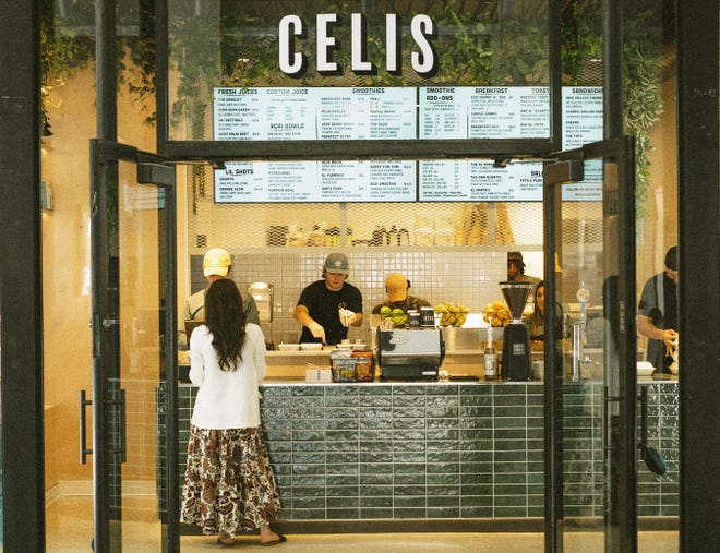 Newly remodeled Celis Juice Bar in Royal Poinciana Plaza features walnut- and green-hued tile.