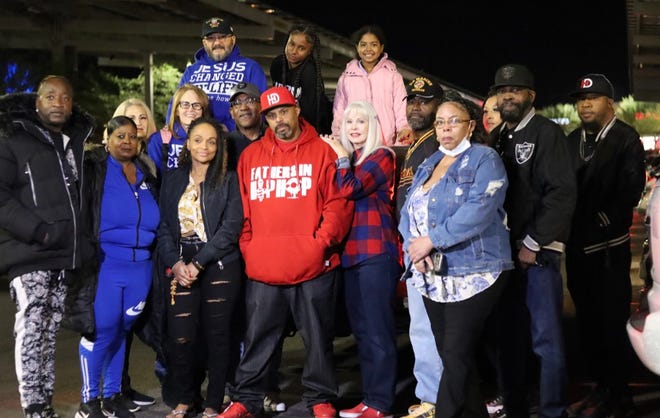 Super Walmart shoppers in Victorville were surprised when the Fathers In Hip Hop nonprofit gave out thousands of dollars in store gift cards just before Christmas.
