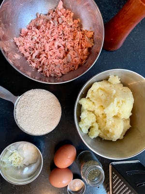 Prepping for salmon potato cakes with just a few simple ingredients.